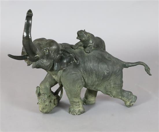 A large Japanese bronze group of tigers attacking an elephant, Meiji period, H. 56cm, L. 68cm, some verdigris